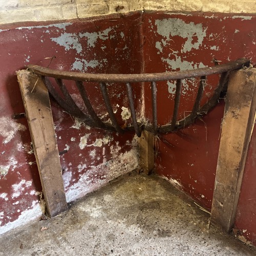 Ancient cast iron hay - cast, rack