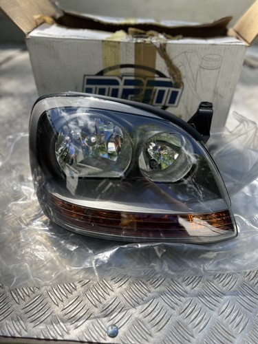 Nissan almera tino headlight - almera,