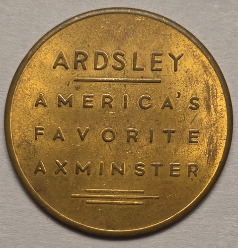 Older brass token alexander - brass,