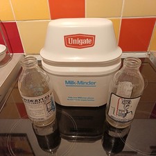 vintage unigat milk-minder with 2 bottles