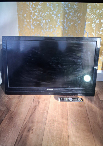 Grundig inch with remote - 94,