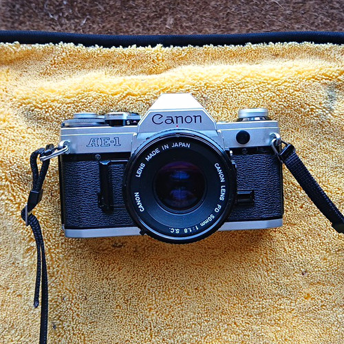 Canon black 35mm slr film - ae-1,