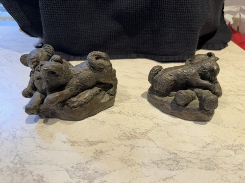 Bronze cast akita and - akita, teddy