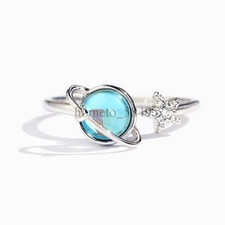 Rotating star and moon ring to