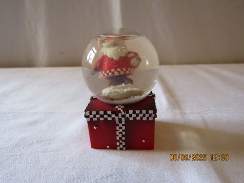 Small santa sitting a - on,