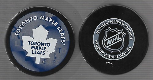 Ice hockey puck toronto maple - ice,