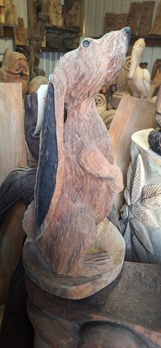 Chainsaw carving hare wood - chainsaw,