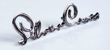 SILVER CROSS PRAM BODY BADGE