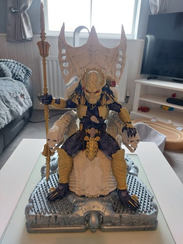 Predator statue with - predator, throne