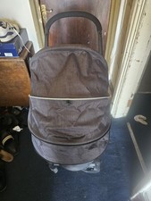 This black pram - is, baby
