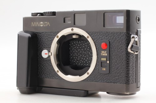 Near mint grip minolta - near, w/