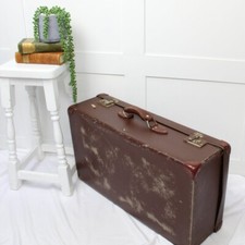 Large Brown 1950's Suitcase with Leather Handle. A Big Case for a Big Statement.