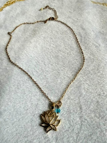 Avon gold tone openwork lotus - avon,