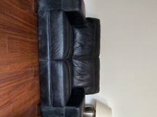 two leather sofas plus