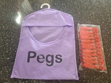 NEW BNIP Pack of 12 red laundry washing line clothes pegs & peg hanger bag - vgc