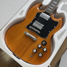 SG yellow electric guitar