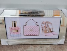Pink heels, bottle, bag