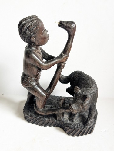 African tribal carved wood - carved,