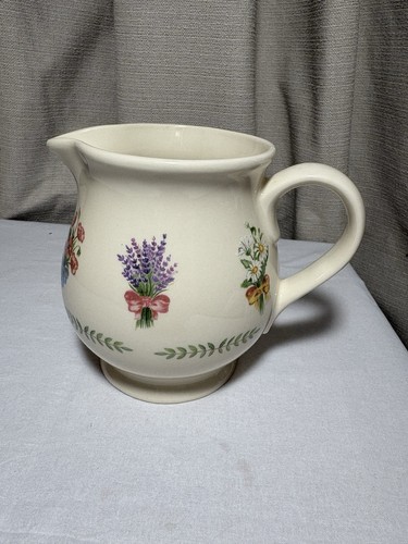 Green pottery jug in - pottery, a