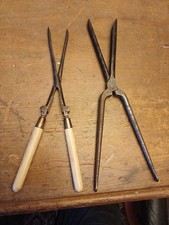 Two Vintage Steel Curling