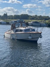 Wooden River boat for sale