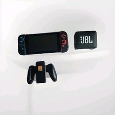 A Nintendo Switch With FREE Jocons Grips And Case With Jbl Speaker And Minecraft