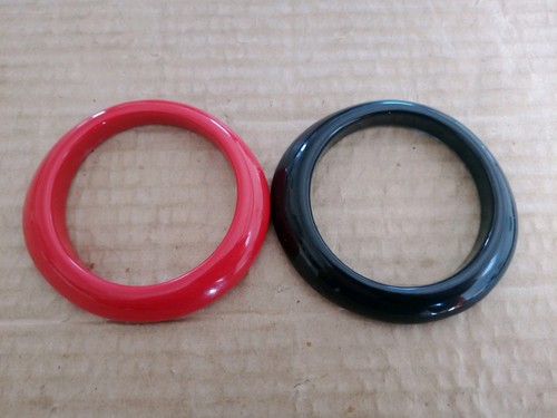 Red and black plastic - red,