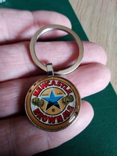 KEY RING NEWCASTLE BROWN ALE KEY RING.