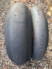 pair of race track slick tyres