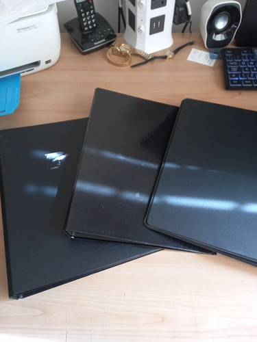 Black 2 ring binder - x,