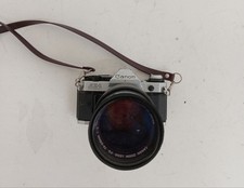 Canon AE-1 Program 35mm SLR Film Camera with Zoom Lens Bundle