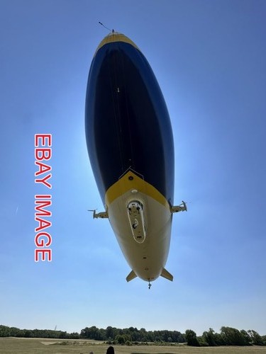 Photo goodyear blimp eclipse - ,