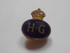 HG    HOME GUARD enamel lapel