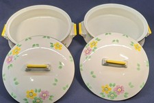 A Pair of Large 'Pallisy' Yellow Lidded Casserole Dishes