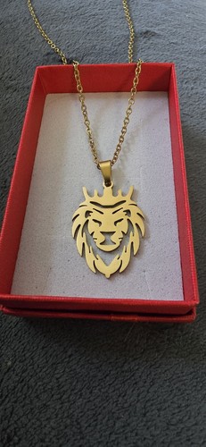 Gold lion head pendant and - head,