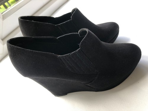 Black suede platform shoes