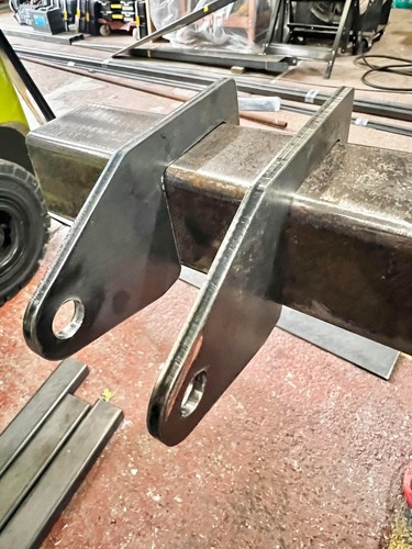 Weld steel hangers open - x,