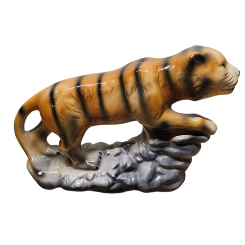 Tiger figurine climbing - tiger,