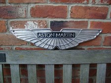 Aston Martin sign cast