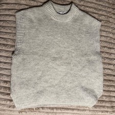 light grey knitted jumper vest