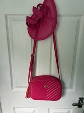 Pink cross body bag and