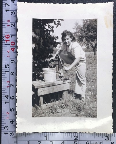 Woman hand pitcher pumping - pitcher,