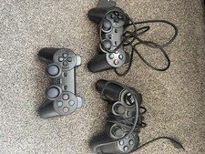 3 Playstation Controllers.