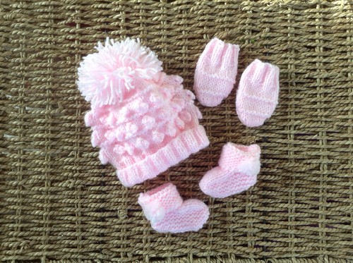 Hand knitted newborn girls - hand,