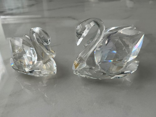 Two swarovski figurine swans - swarovski,