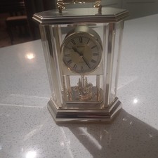 Rhythm Quartz Clock.  