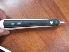 Oral B Vitality electric toothbrush type 3757 in black with 3 new brush heads