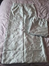 Modern used curtains 46x72 in a mint  green tone with swirl design