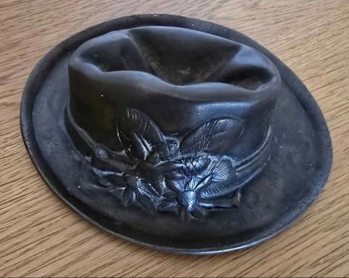 Old bronze hat ornament - old,