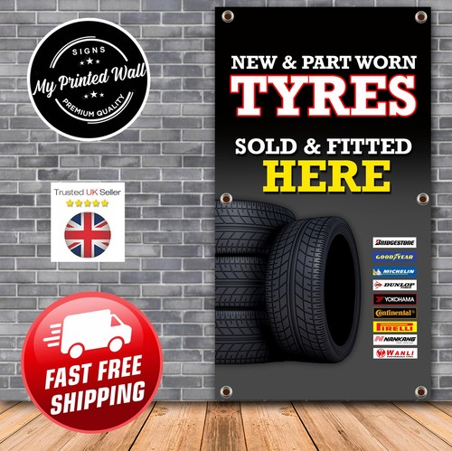 Car tyres fitted here - fitted, vertical